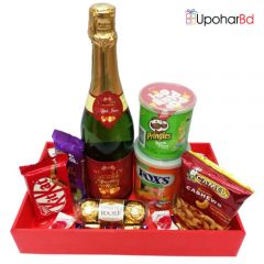 Heart shaped gift box with roses and macaroon